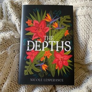 Owlcrate exclusive edition of “The Depths” by Nicole Lesperance